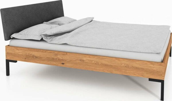 Dvoulůžková postel z dubového dřeva s čalouněným čelem 140x200