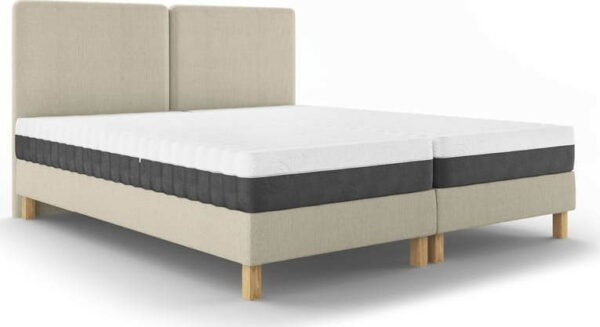 Béžová čalouněná dvoulůžková postel s roštem 180x200