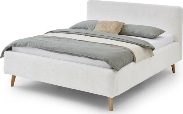 Bílá čalouněná dvoulůžková postel s úložným prostorem s roštem