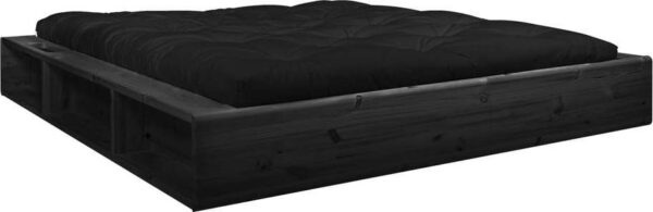 Černá dvoulůžková postel z masivního dřeva s černým